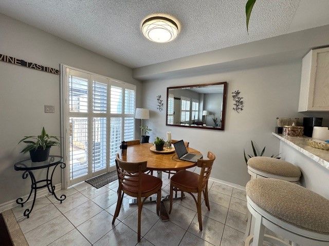 Situated At A Quiet Family Oriented Neighbourhood Within Prestigious Iroquois Ridge H.S. Boundary. Walk To Parks, Trails. Mins To Shopping Centre And Hwy Access. Hardwood Floor On Main Living Area And 2nd Floor. Tiled Floor In Foyer/Dining/Kitchen. Professionally Finished Basement, Open Concept With A Full Bath. Ceiling Fans In All 2nd Floor Bedrooms. Beautiful Backyard With A Huge Deck And Professionally Installed Artificial Turf for Easy Maintenance. Ideal place for a young family to call it home!