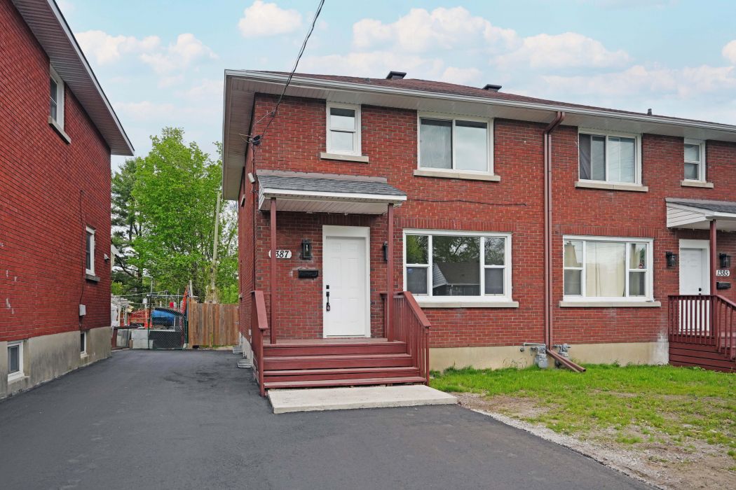 DOUBLE SIDE-BY-SIDE ~ LIVE IN ONE & RENT OUT THE OTHER or MULTI-GENERATIONAL or INVESTMENT. This ALL BRICK DOUBLE offers 2 SEMI- DETACHED homes in central location ~ STEPS TO transit, Carlington Park, Experimental Farm, shopping, restaurants & more ~ MINS TO 417, Civic Hospital, excellent schools, Mooney's Bay, Westboro and downtown.  Both homes offers a spacious floor plans, private parking, newly paved driveways, newly fenced backyards, hardwood flooring throughout (main, second and staircase) and large windows that fill the homes in natural light. The living room has a large window and is open to the dining room (which is great for entertaining). One of the units has renovated kitchen, bathroom and re-finished hardwood floors. 3 good sized bedrooms, all with good storage and large windows. Full basement with tons of room for storage. Don't miss out on this great investment opportunity in a great central location. Call today for a private viewing.