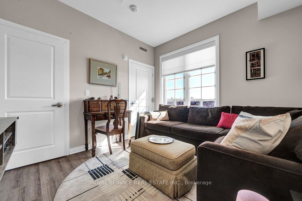 Large Window w/ Views of Greenspace &peeks of lake