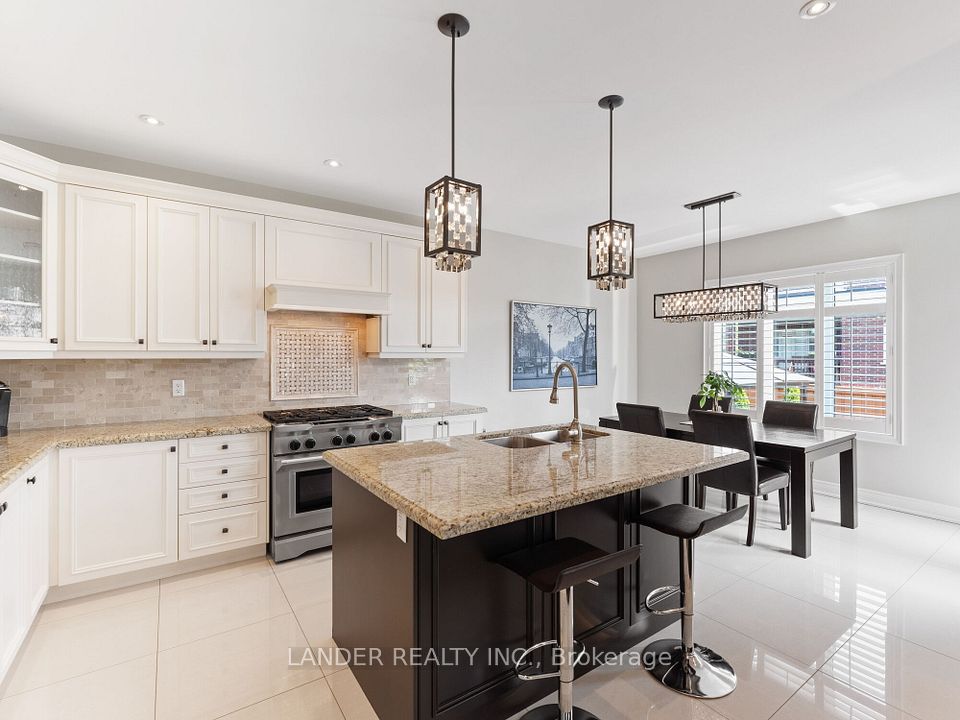 Upgraded Cabinets, Porcelain Tile and Backsplash