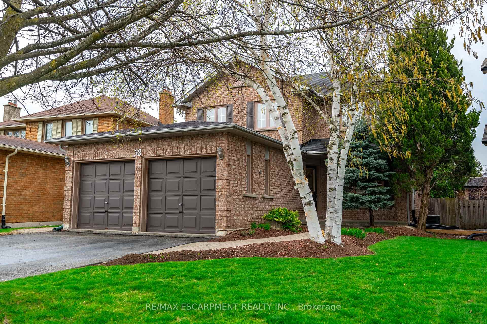 38 Fellowes Crescent Hamilton, Ontario Welcome to this beautifully maintained 3+1 bedroom, 2.5 bathroom home tucked away on a quiet crescent in mature East Waterdown. Ideally situated near top-rated schools, scenic parks, and GO Transit, this family-friendly home offers both comfort and convenience. Enjoy a bright, functional layout with a welcoming living room, a family room with fireplace, eat-in kitchen, and a cozy dining area perfect for entertaining. Upstairs, find three generous bedrooms, including a primary bedroom with private ensuite. The fully finished basement adds a fourth bedroom, large rec room with a gas fireplace and ample storage - ideal for guests or a home office. Step outside to a private backyard retreat and take advantage of the double car garage and extended driveway. A rare find in a highly sought-after neighbourhood! RSA.