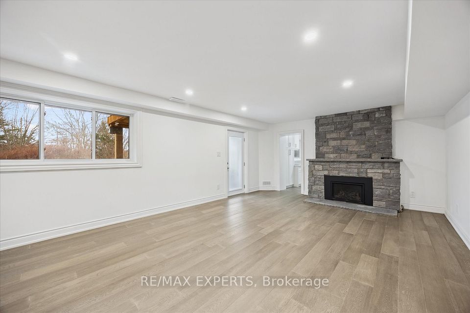 Stone Fireplace, Hdwd Floors & Walk-out To Patio