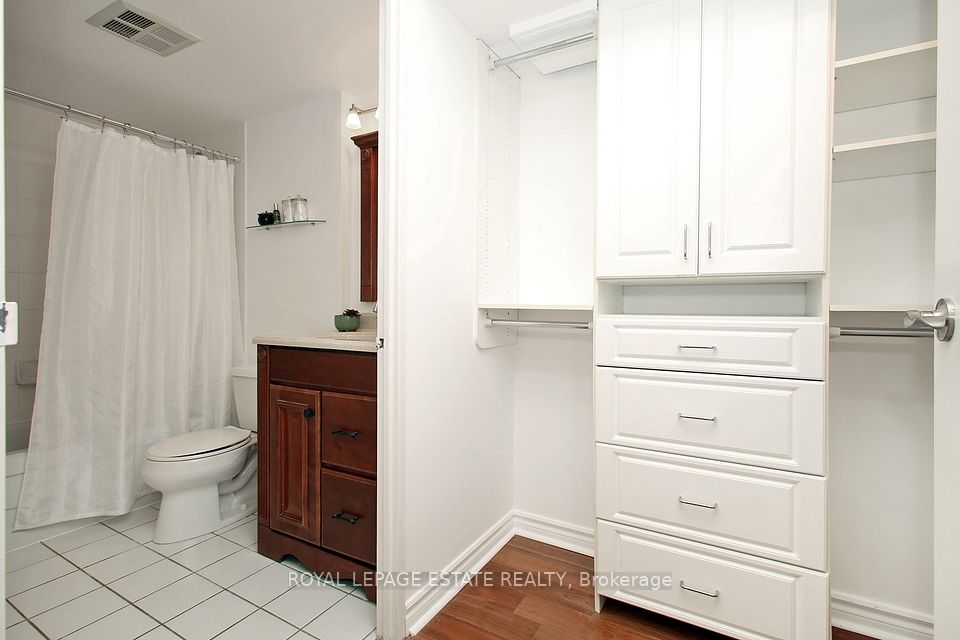 Built in shelves and drawers in the walk-in closet