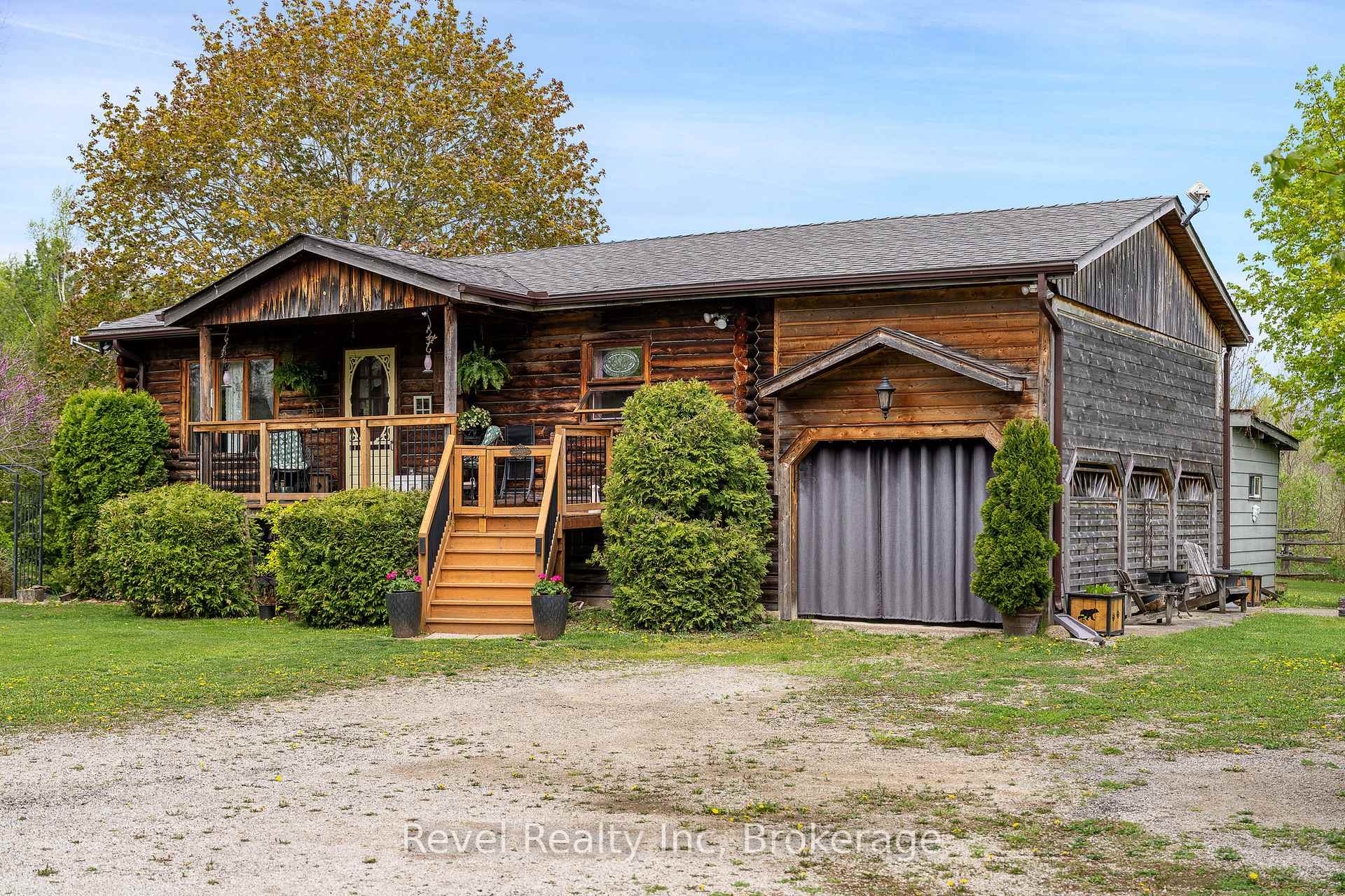 Welcome to 383349 Dawson Road in beautiful Georgian Bluffs where privacy, nature, and charm come together in this stunning custom-built log home. Inside, the warmth of natural wood surrounds you with a breathtaking log exterior and interior, soaring ceilings, and an open-concept design that instantly makes you feel at home. The main floor offers everything you need with two spacious bedrooms, a cozy living area, and an eat-in kitchen perfect for family dinners, all with access to a potential walk-out balcony for serene views. Downstairs, the fully finished lower level boasts large windows, warm tones, and another open-concept living space ideal for guests, multi-generational living, or income potential. Outside, the property is a dream, landscaped to perfection and backing onto nothing but nature, offering peaceful views and year-round beauty. Whether you're looking for a family retreat, a full-time residence, or an investment opportunity, this home is truly one of a kind.