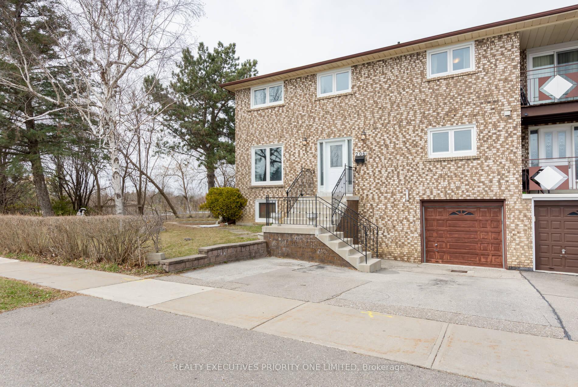206 Andrew Park Vaughan, Ontario Look no further & welcome home! Rare opportunity in amazing location! Well maintained 2 storey, 3 bedroom semi that feels like a detached! High Sought after area with everything you need just minutes away - a commuters dream! Large mature ravine lot is fully fenced & finished with interlock patio, Walk Out/Separate Entrance to a finished basement with 3 pc bath & kitchenette- great for potential rental/inlaw suite. Cozy Neutral Tones and Hardwood floors throughout. Love to entertain? Wether its a formal dinner setting in your seperate dining room or a casual get together in your Spacious Eat - In Kitchen that boosts great cabinet/counter space, stainless steel appliances and beautiful Balcony overlooking ravine- this house truly feels like home! Endless possibilities, come see for yourself!