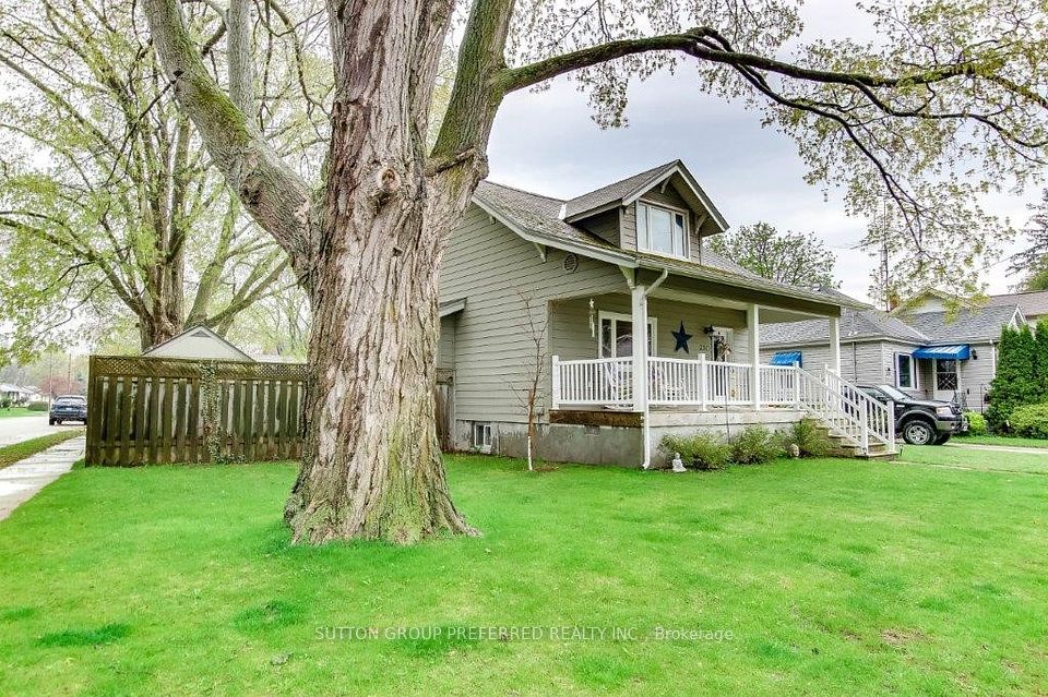 2517 Queen Street Strathroy-Caradoc, Ontario Welcome to 2517 Queen Street in the heart of family-friendly Mount Brydges! This charming home offers the perfect blend of small-town living with modern updates, all just a short drive to London. Located directly across from a park and splash pad, its ideal for growing families or anyone who loves a little green space right outside their door.Inside, youll find 3 generously sized bedrooms, including one on the main floor, making it perfect for flexible living arrangements. Both bathrooms have been recently updated, and the home features fresh paint, new flooring in key areas, and high ceilings that give it an open, airy feel. The updated kitchen is bright and functional, with plenty of cupboard space and modern finishes.All windows and doors have been replaced, providing energy efficiency and peace of mind. Storage wont be an issue with big closets throughout and a finished basement offering even more space to spread out.Outside, the fully fenced backyard is ready for kids, pets, or entertaining. The double car garage comes equipped with hydro, great for a workshop, hobby space, or just keeping your vehicles warm and dry.If you're looking for a move-in ready home in a welcoming community, this one checks all the boxes!
