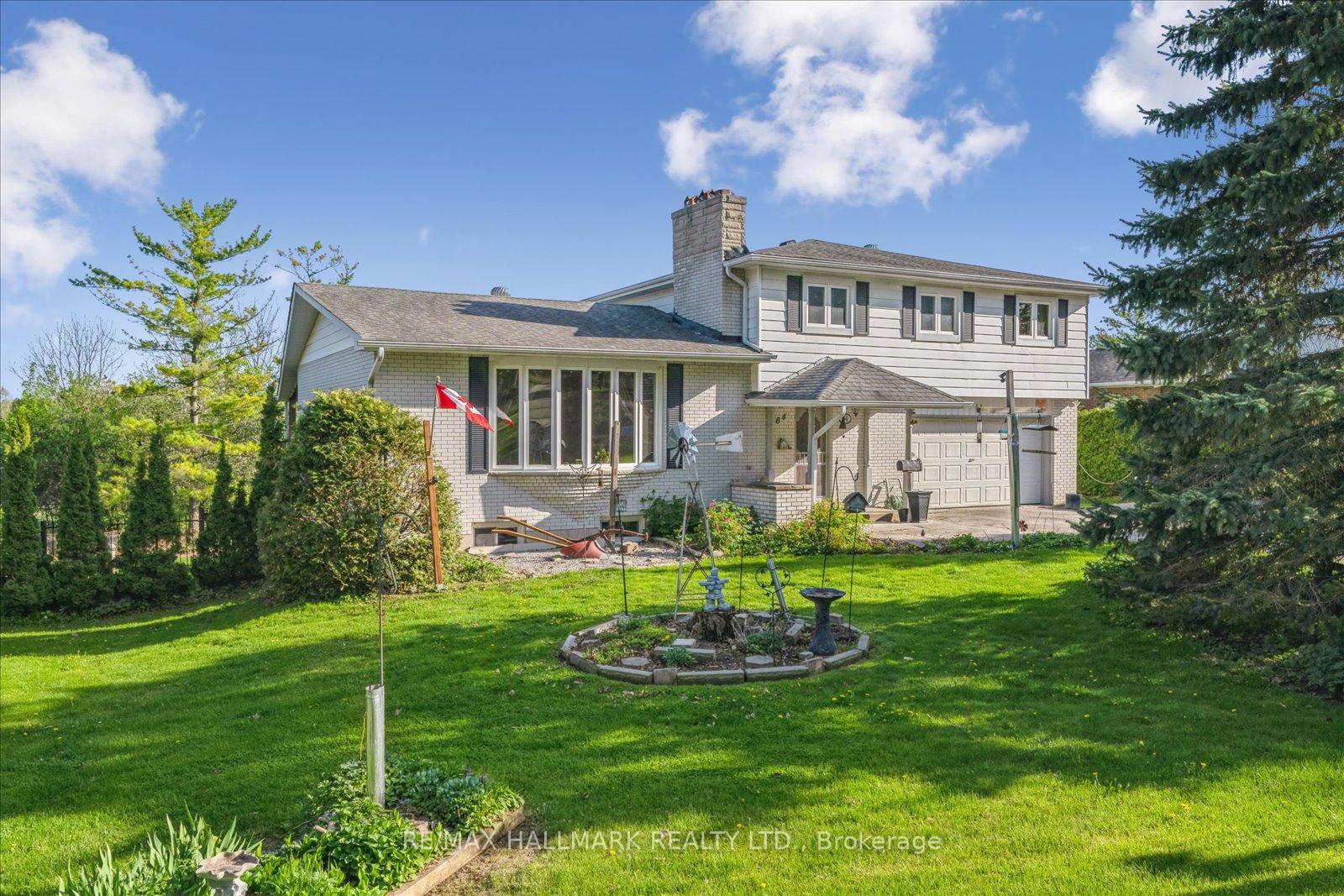 Welcome to this large 4 bedroom, 3 bathroom sidesplit on a spectacular private lot overlooking large private yard, pasture & creek in the heart of beautiful Cannington!! large principal rooms, two stone and brick fireplaces *, new roof 2017, new furnace 2024,  finished  basement newly painted and new laminate floors w walkout to yard at ground level. Double attached garage,! Walk to town, stores, Trails, parks and schools. Wont last long! See today!