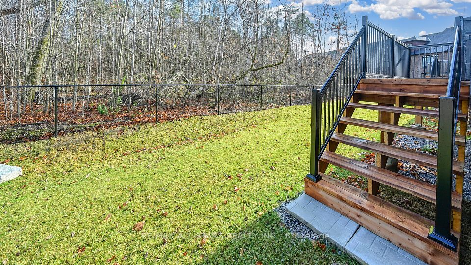 Backs onto protected wood lot