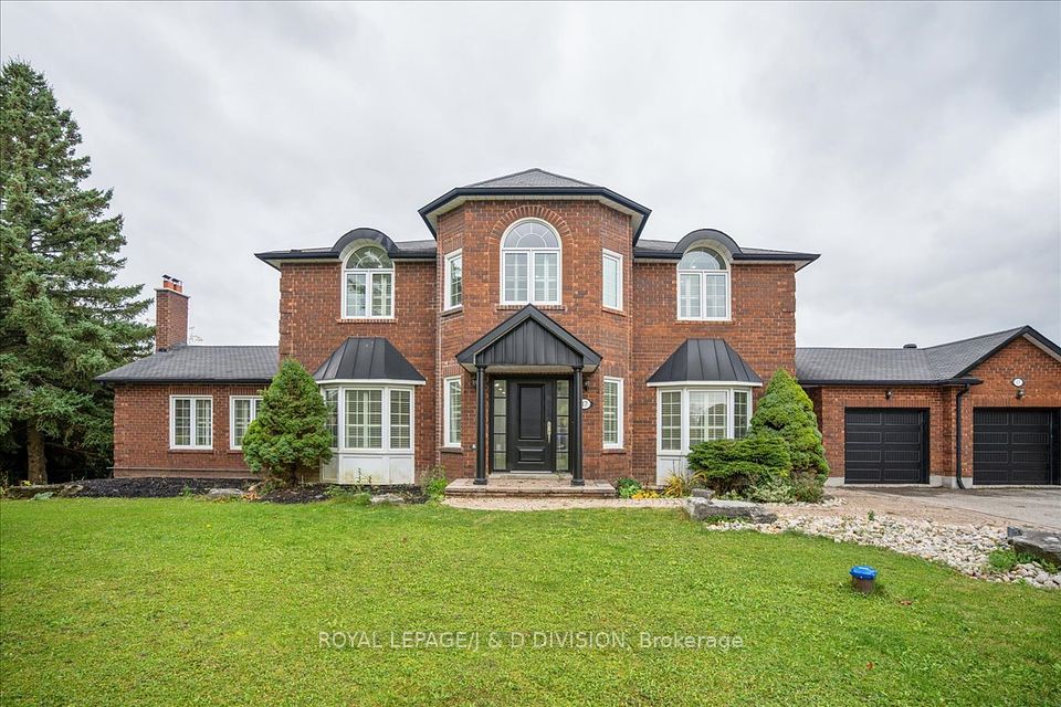 Front door Portico, 2 bay windows & side entrance