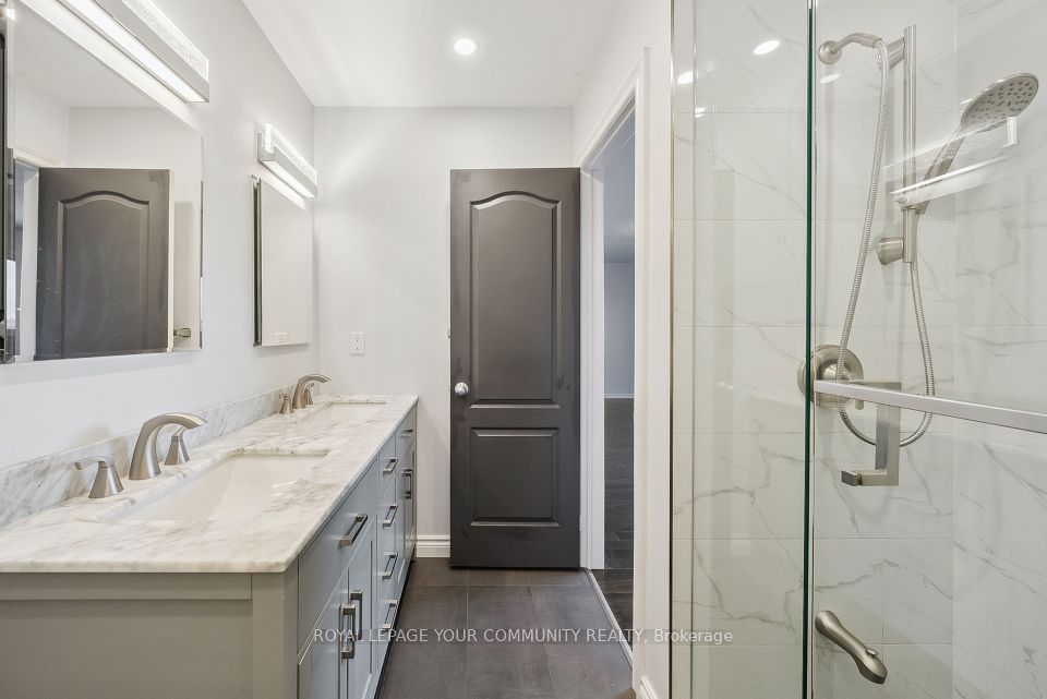 Large shower stall with porcelain tiles